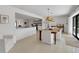 Open dining room with modern decor and access to additional living areas at 2084 Massachusetts Ne Ave, St Petersburg, FL 33703