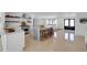 Bright kitchen featuring a large island, stainless steel appliances, and an open concept design at 2084 Massachusetts Ne Ave, St Petersburg, FL 33703
