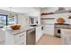 Bright kitchen features marble counters, stainless steel appliances, and stylish fixtures at 2084 Massachusetts Ne Ave, St Petersburg, FL 33703