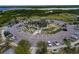 Aerial shot of large parking area and park with observation tower at 214 Lookout Dr, Apollo Beach, FL 33572