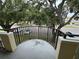 A balcony with views of the common area and parking at 2295 Mexican Way # 41, Clearwater, FL 33763