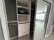 Bedroom closet featuring built-in shelving and drawers with mirrored doors at 2295 Mexican Way # 41, Clearwater, FL 33763