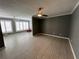 Open concept living room with tiled floor and natural lighting at 2295 Mexican Way # 41, Clearwater, FL 33763
