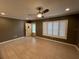Beautifully finished living room featuring tile floors, white trim, and natural light at 2295 Mexican Way # 41, Clearwater, FL 33763