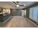 Bright living room featuring tile floors, white trim, and natural light at 2295 Mexican Way # 41, Clearwater, FL 33763