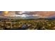 Stunning aerial view of a waterfront community featuring lush landscapes and beautiful homes at sunset at 24260 Vincent Ave, Punta Gorda, FL 33955