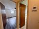 Hallway view to bedroom and bathroom at 3035 Coldwell Dr, Holiday, FL 34691