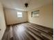 Comfortable bedroom featuring stylish flooring and bright windows for natural light at 3035 Coldwell Dr, Holiday, FL 34691