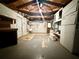 A spacious garage with a workbench, utility sink and overhead lights at 3035 Coldwell Dr, Holiday, FL 34691