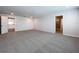 Large carpeted bonus room with neutral walls, recessed lighting, and access to a bathroom at 3063 Marine Grass Dr, Wimauma, FL 33598