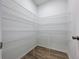 Walk-in closet featuring adjustable wire shelving to maximize storage space at 3063 Marine Grass Dr, Wimauma, FL 33598