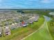 Wonderful aerial view showcases this property's location in a vibrant community with beautiful lake views at 31775 Sun Kettle Loop Loop, Wesley Chapel, FL 33545