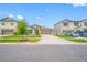 Attractive single story home with green lawn, complemented by neat landscaping at 31775 Sun Kettle Loop Loop, Wesley Chapel, FL 33545