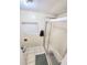 Clean and functional bathroom featuring a glass shower door and tile floors at 33516 Arthur Dr, Wesley Chapel, FL 33543
