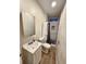 Bathroom featuring a modern vanity and walk-in shower with dark fixtures at 33516 Arthur Dr, Wesley Chapel, FL 33543