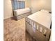 Inviting bedroom featuring two twin beds, carpet, and neutral decor at 33516 Arthur Dr, Wesley Chapel, FL 33543