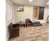 Bonus room with tile floors, sliding glass door access, and natural light at 33516 Arthur Dr, Wesley Chapel, FL 33543