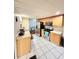 Well-lit kitchen with stainless steel appliances, tile flooring, and ample counter space at 33516 Arthur Dr, Wesley Chapel, FL 33543