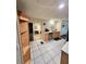 Bright kitchen boasts stainless steel appliances, tile floor, and convenient access to a patio at 33516 Arthur Dr, Wesley Chapel, FL 33543