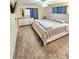 Spacious main bedroom with carpet, dresser, TV, and neutral wall color at 33516 Arthur Dr, Wesley Chapel, FL 33543