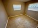 Bedroom with neutral walls, tiled floor and single window for natural light at 3654 Corsair Ct, New Port Richey, FL 34652