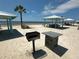 Community beach amenities include picnic areas, barbecue grills, and serene ocean views at 3654 Corsair Ct, New Port Richey, FL 34652