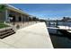 Waterfront property with dock, patio, and views of the water from the home at 3654 Corsair Ct, New Port Richey, FL 34652