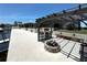 Outdoor patio features a fire pit, bar seating, and bench seating at 3654 Corsair Ct, New Port Richey, FL 34652