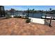 Brick paver patio provides access to the boat dock and stunning waterfront views at 3654 Corsair Ct, New Port Richey, FL 34652