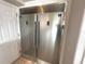 Stainless steel built-in refrigerator and freezer provide ample kitchen storage space at 3654 Corsair Ct, New Port Richey, FL 34652