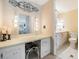 Bathroom features a vanity with lighting and an adjacent toilet at 36750 Beth Ave, Zephyrhills, FL 33542