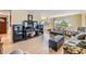 Inviting living area featuring comfortable seating, a media center, and great natural light at 36750 Beth Ave, Zephyrhills, FL 33542