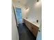 Bathroom with double vanity with drawers and storage cabinets at 4311 W Sevilla St, Tampa, FL 33629