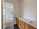 Bathroom featuring a double vanity with quartz countertop and modern fixtures at 4311 W Sevilla St, Tampa, FL 33629