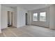 Well-lit bedroom with multiple windows and neutral finishes, creating a serene and comfortable atmosphere at 4311 W Sevilla St, Tampa, FL 33629