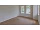 Bright bedroom features natural light from two windows and neutral walls at 4311 W Sevilla St, Tampa, FL 33629