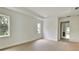 Spacious bedroom with large windows and tray ceiling, providing ample natural light and architectural detail at 4311 W Sevilla St, Tampa, FL 33629