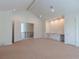 Bright bonus room boasts vaulted ceilings, neutral carpet, wet bar, and access to an upstairs landing at 4311 W Sevilla St, Tampa, FL 33629