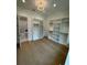 Spacious walk-in closet featuring custom shelving and lighting at 4311 W Sevilla St, Tampa, FL 33629