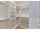 Walk-in closet features custom shelving for maximum storage and organization at 4311 W Sevilla St, Tampa, FL 33629