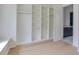 Walk-in closet with custom shelving and ample storage space, designed for organization and convenience at 4311 W Sevilla St, Tampa, FL 33629