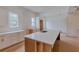Spacious kitchen features an island with seating and stainless steel appliances at 4311 W Sevilla St, Tampa, FL 33629