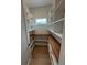 Walk-in pantry with custom shelving, wooden countertop, and a window at 4311 W Sevilla St, Tampa, FL 33629