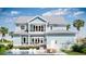 A beautiful backyard featuring a pool, patio, and outdoor dining area at 4311 W Sevilla St, Tampa, FL 33629