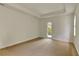 Bright room with a door leading to an outdoor space, enhancing the connection between indoor and outdoor living at 4311 W Sevilla St, Tampa, FL 33629