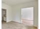 Well-lit room with white walls and trim, featuring an open layout and potential for versatile use at 4311 W Sevilla St, Tampa, FL 33629