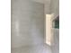 Modern shower with elegant tiling and a built-in niche, offering a luxurious and functional space at 4311 W Sevilla St, Tampa, FL 33629