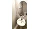 This bathroom features a modern sink with faucet, vanity and toilet at 4505 Globe Thistle Dr, Tampa, FL 33619