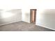 Bedroom features neutral-toned walls and plush carpet flooring at 4505 Globe Thistle Dr, Tampa, FL 33619