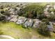 Aerial shot showcasing the backyard and wooded area behind this residential property at 4508 Netherwood Dr, Tampa, FL 33624